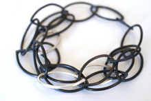 steel and silver leaf bracelet