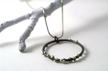 silver on steel pendant