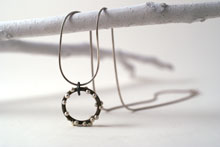 silver on steel pendant