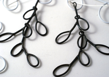 triple linked leaf earrings