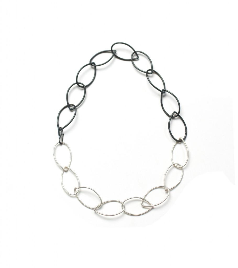 black and silver two-tone necklace by megan auman