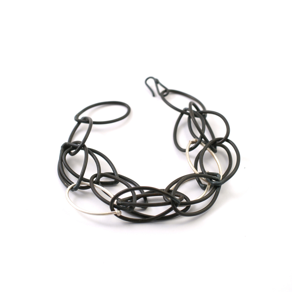 black and silver multi chain bracelet by megan auman