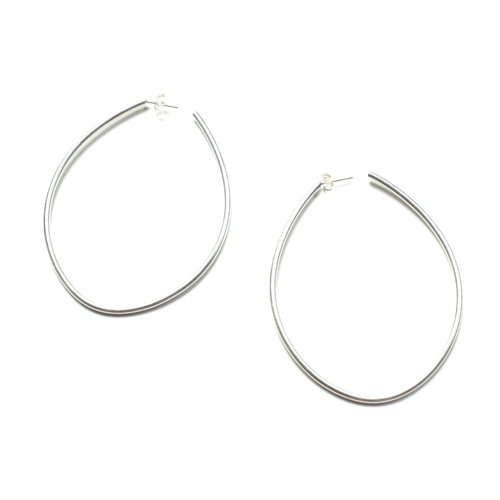 silver droplet hoop earrings by megan auman