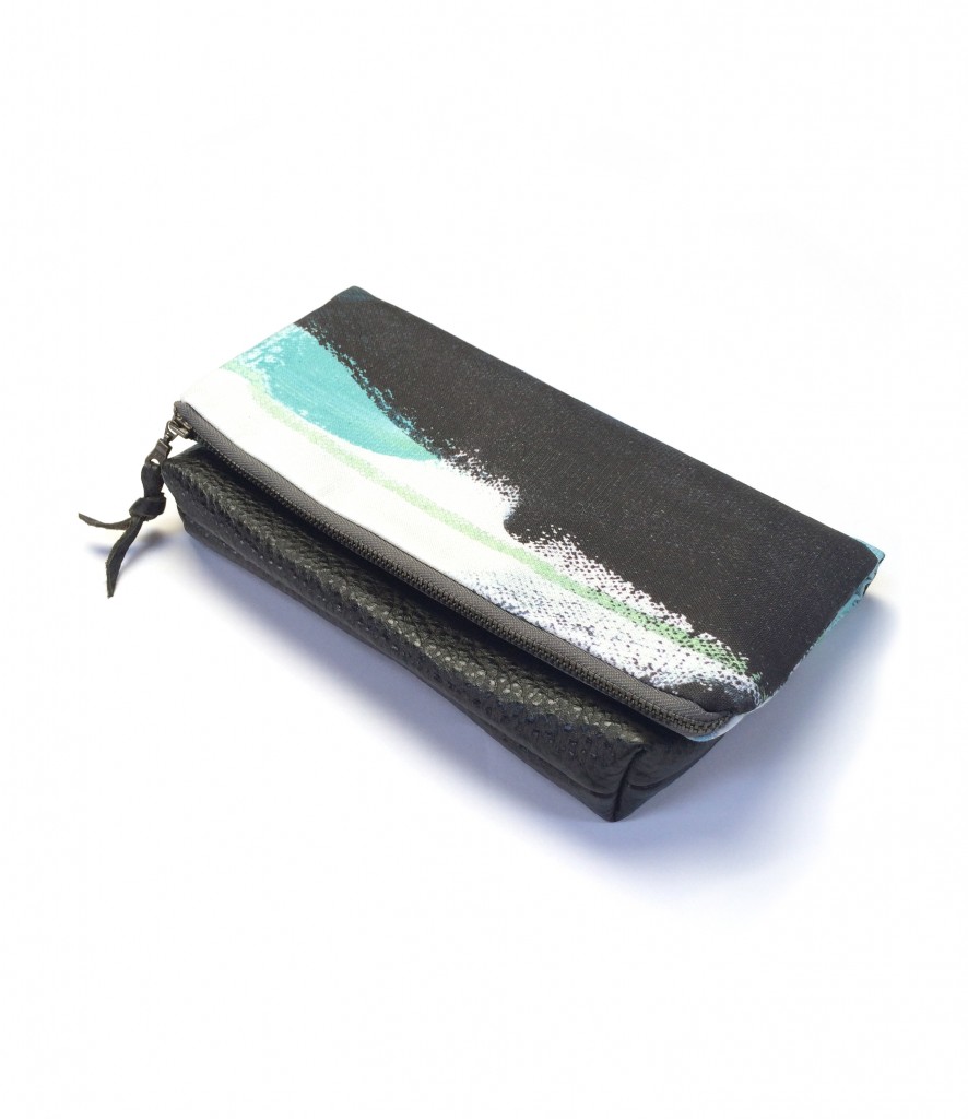 wings foldover clutch purse in teal, black, and white