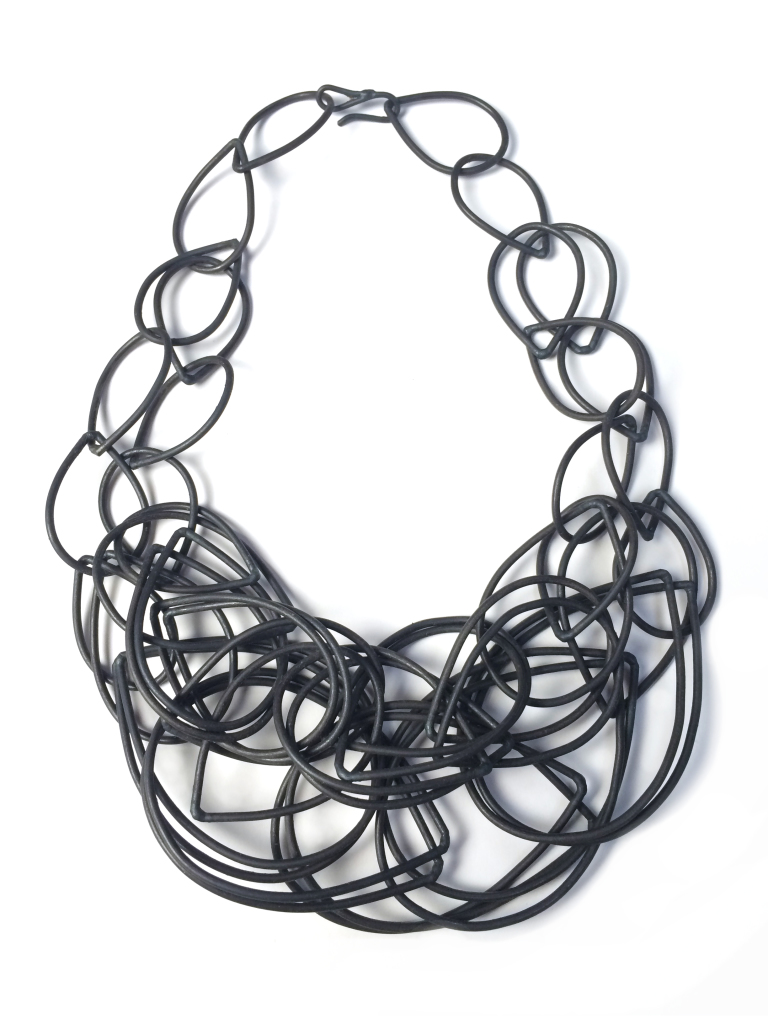 gritty meets glam - steel statement necklace by megan auman