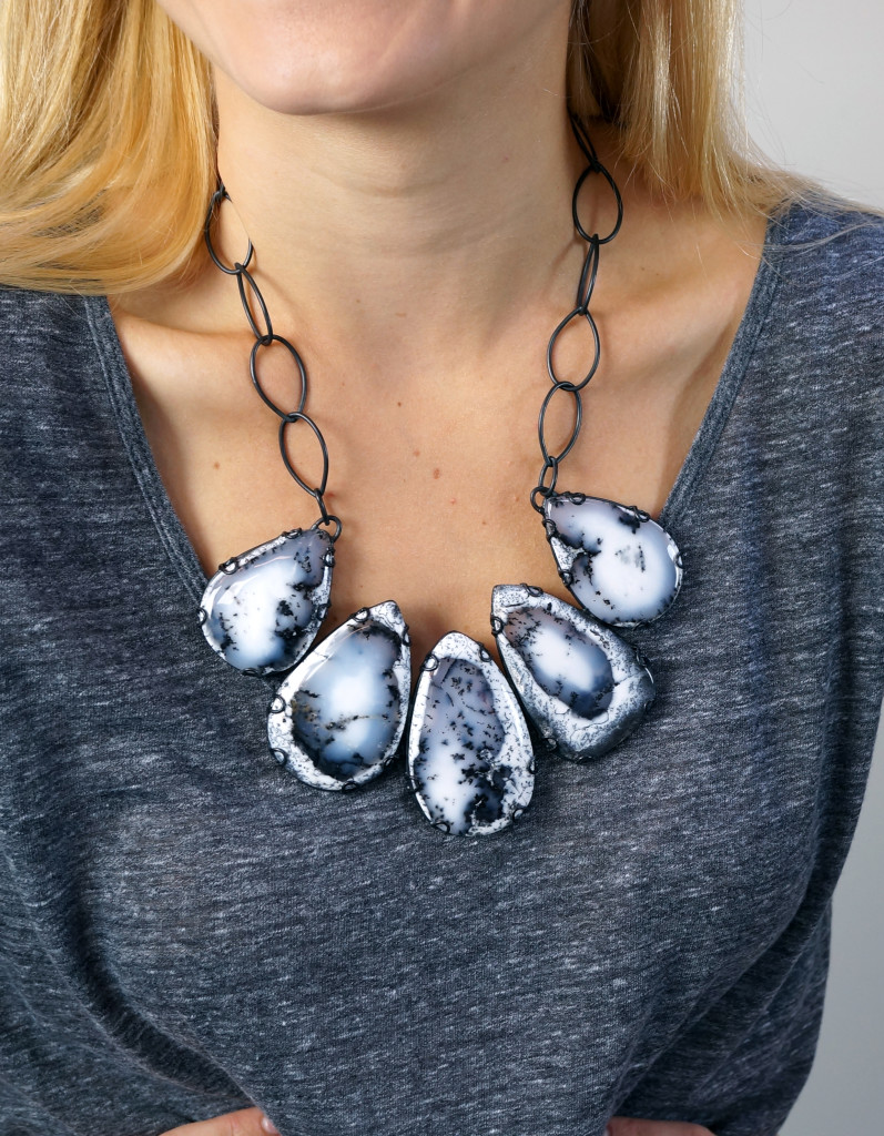 casual style: bold bib statement necklace with t-shirt and jeans