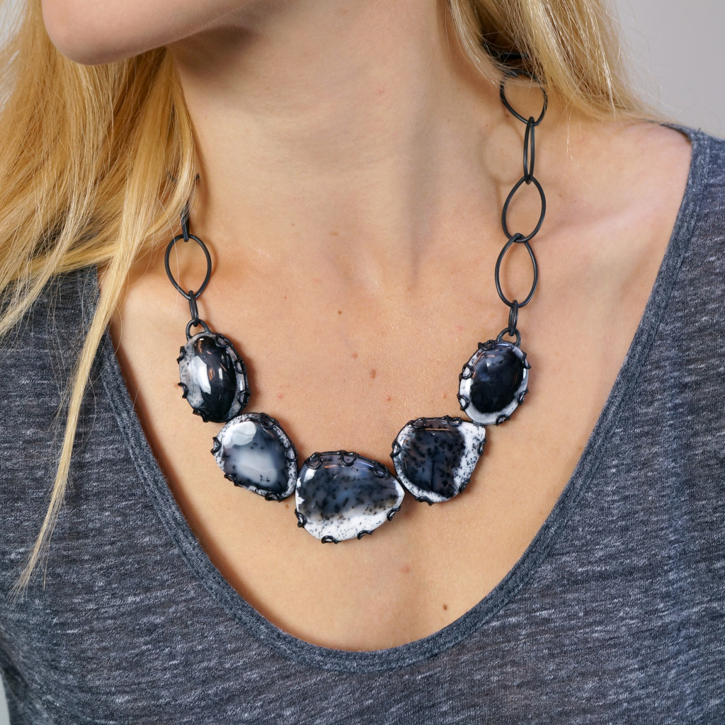 chic and edgy holiday party style with a stunning one of a kind necklace