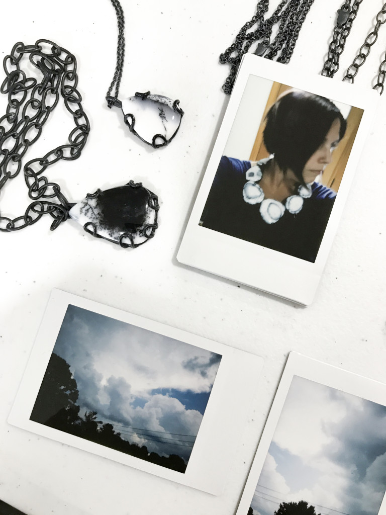 fuji instax photos - self portrait with statement necklace and clouds