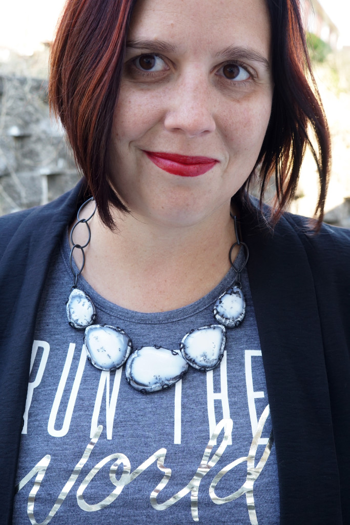 run the world tank with statement necklace and blazer