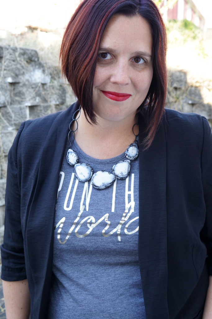 statement necklace and run the world t-shirt with blazer