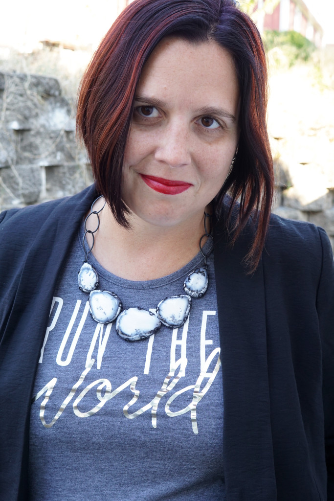 statement necklace and printed t-shirt with blazer