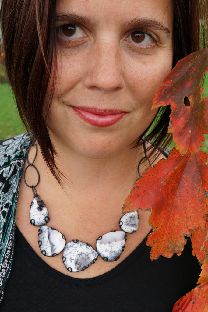 fall fashion portrait with unique black and white statement necklace