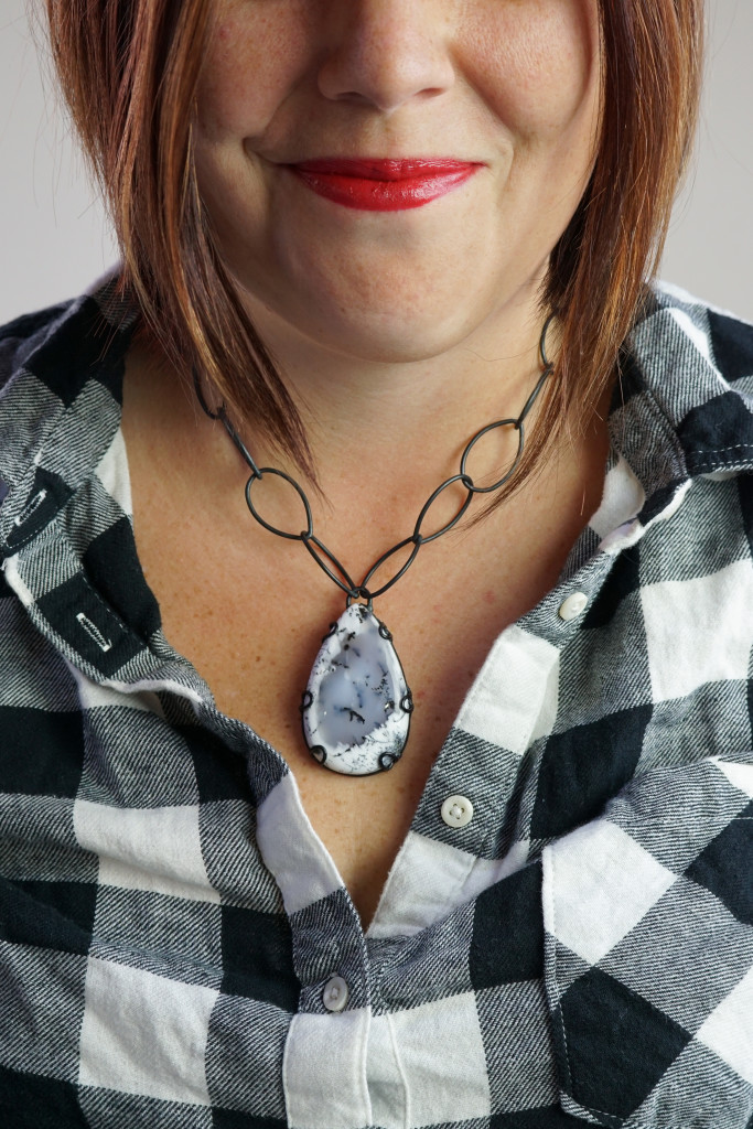 what necklace to wear with flannel button down shirt: chunky amulet gemstone necklace
