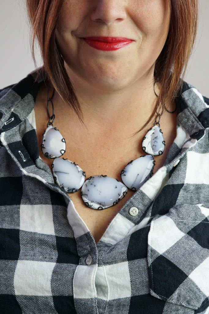how to wear a statement necklace with a flannel button down shirt