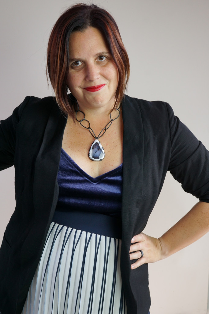 holiday party outfit: navy and black with one of a kind gemstone necklace