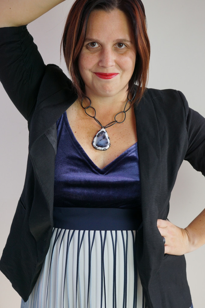 holiday party outfit: navy and black with one of a kind gemstone necklace