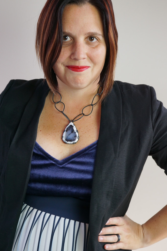 holiday party outfit: navy and black with one of a kind gemstone necklace