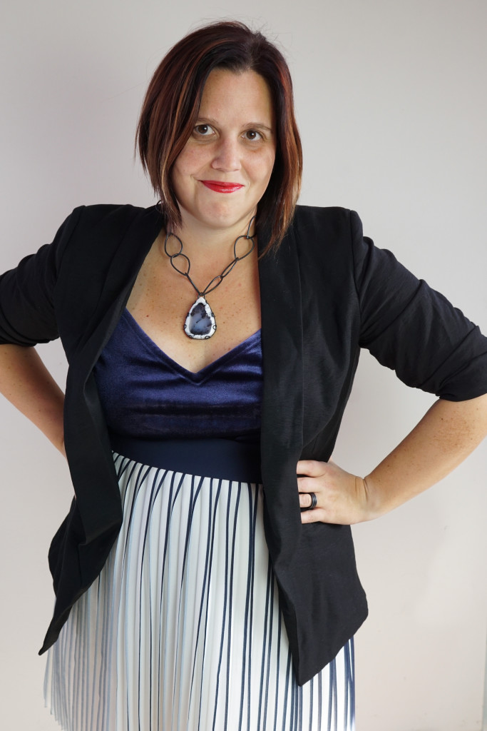 office holiday party outfit: navy and black with one of a kind gemstone necklace