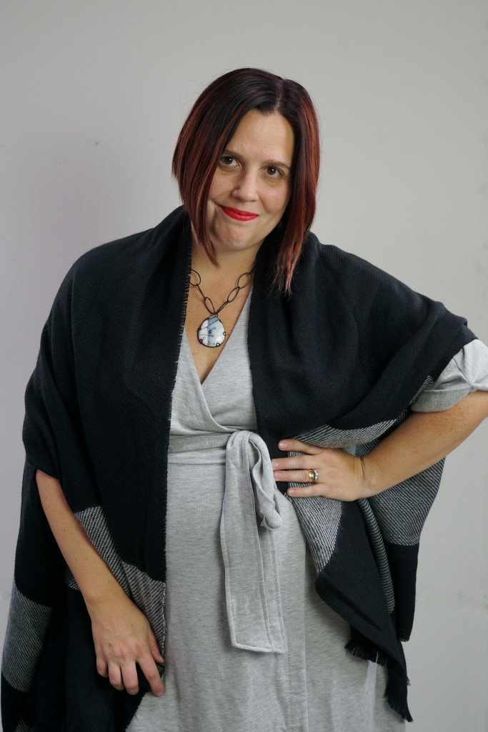 one dress, thirty ways style challenge: cozy winter style with a grey wrap dress, black shawl, and chunky gemstone necklace