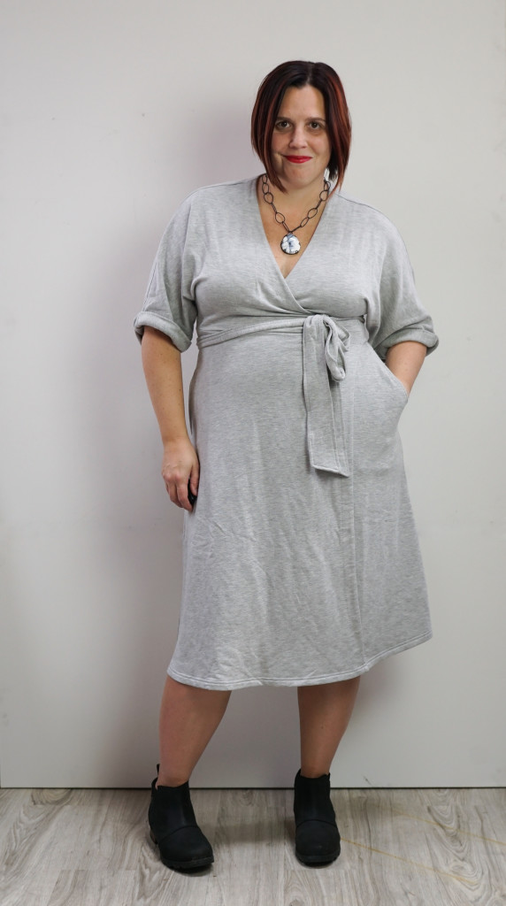 grey wrap dress, black booties, chunky gemstone necklace