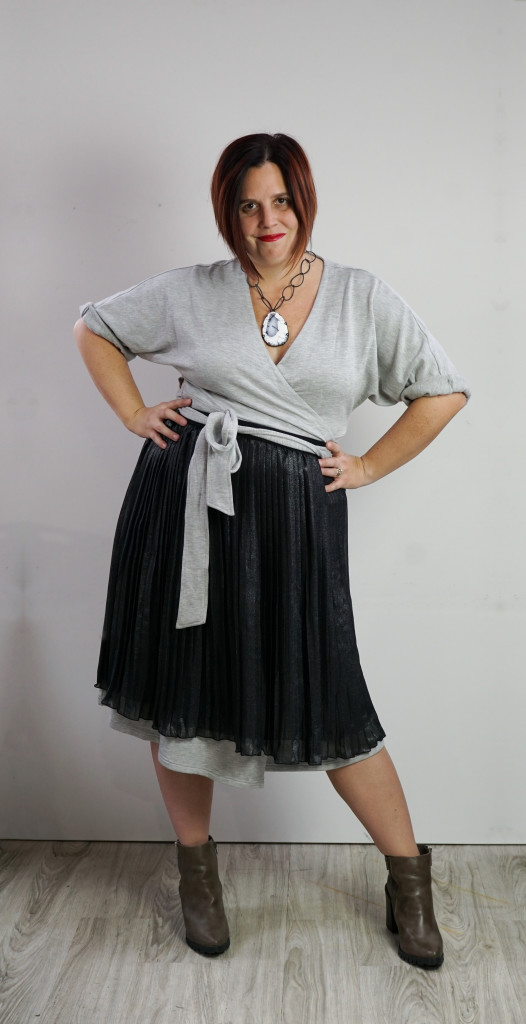one dress, thirty ways style inspiration: inspired by late 50s, early 60s movie style: grey wrap dress, black pleated skirt, and chunky gemstone statement necklace (for a touch of attitude)