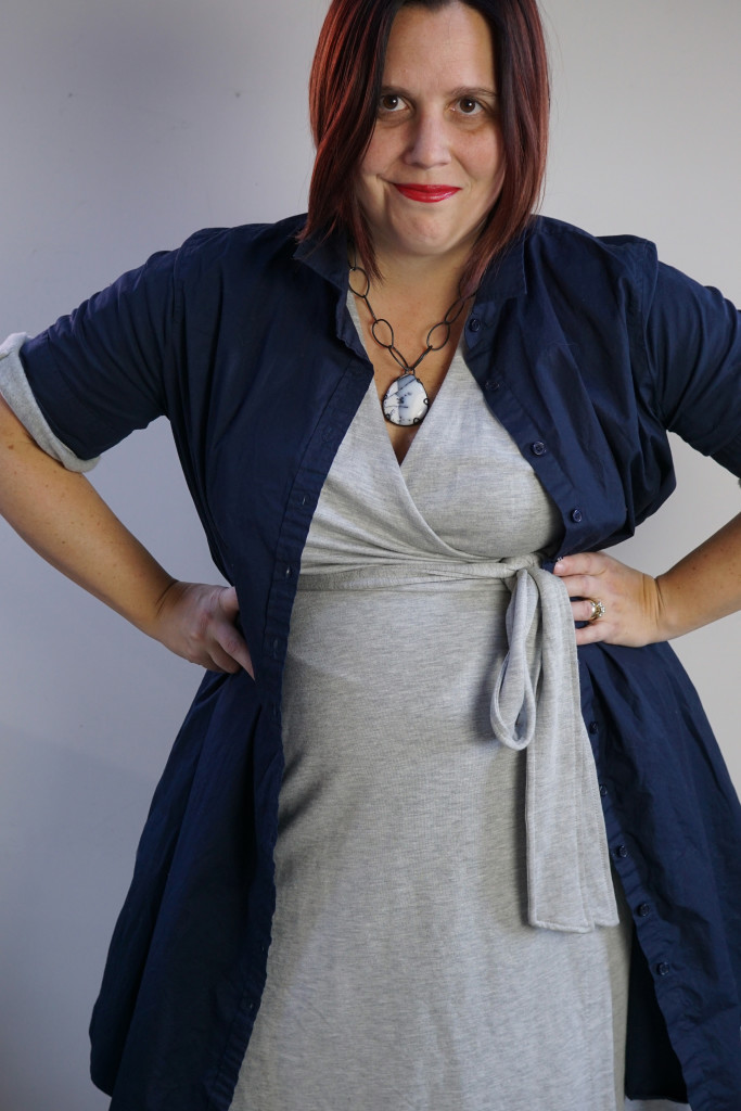 one dress thirty ways bold style challenge: navy shirt dress over grey wrap dress with chunky gemstone necklace