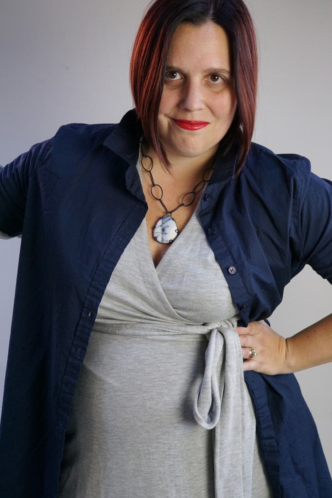 one dress thirty ways bold style challenge: navy shirt dress over grey wrap dress with chunky gemstone necklace