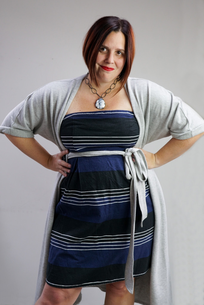 one dress, thirty ways style challenge: grey wrap dress over striped strapless dress with chunky gemstone necklace