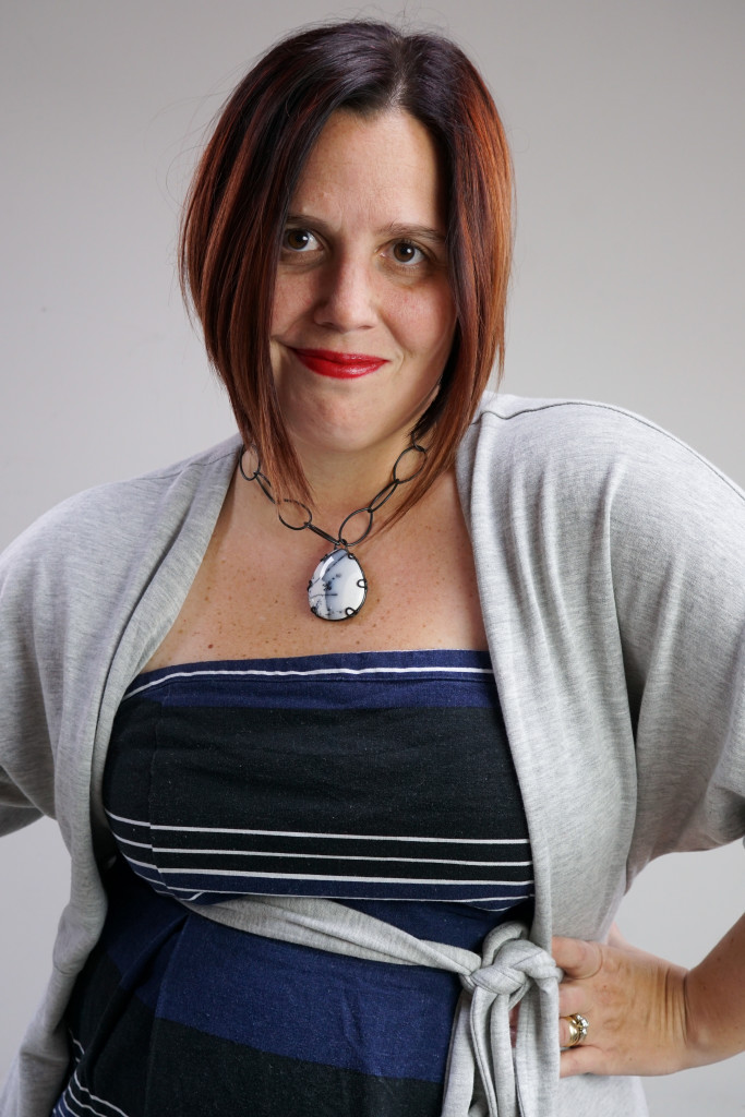 one dress, thirty ways style challenge: grey wrap dress over striped strapless dress with chunky gemstone necklace