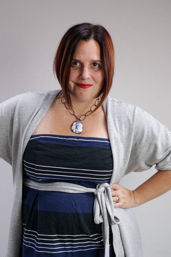 one dress, thirty ways style challenge: grey wrap dress over striped strapless dress with chunky gemstone necklace