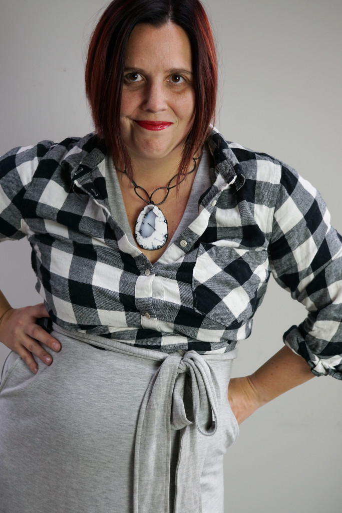 bold comfortable style: sweatshirt wrap dress, buffalo plaid flannel shirt, and chunky gemstone necklace