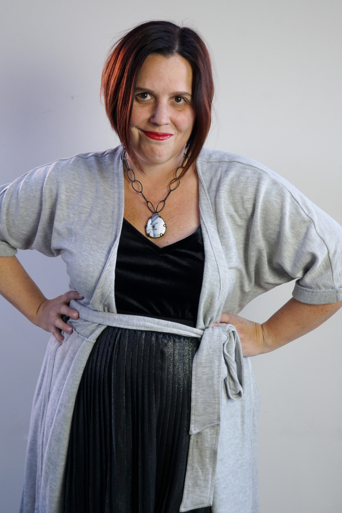 one dress thirty ways style inspiration: grey wrap dress as duster cardigan over metallic pleated skirt and velvet cami