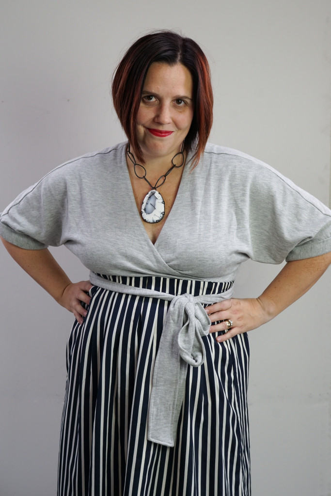 one dress, thirty ways style challenge: grey wrap dress with striped midi skirt and chunky gemstone necklace