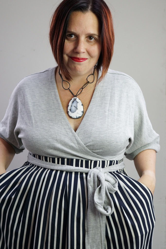 one dress, thirty ways style challenge: grey wrap dress with striped midi skirt and chunky gemstone necklace