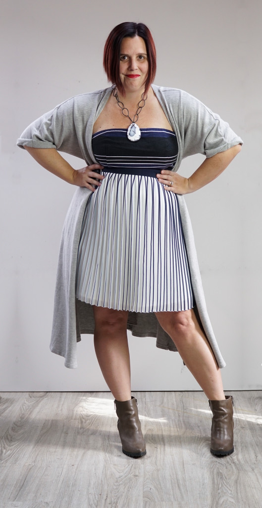 one dress thirty ways outfit inspiration: grey wrap dress over pleated skirt and strapless dress with chunky amulet necklace