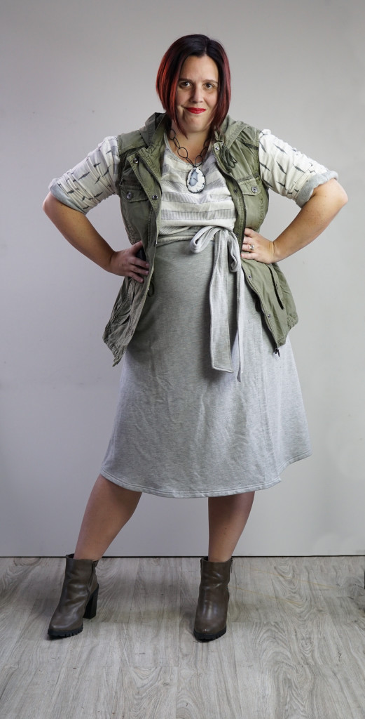 one dress, thirty ways outfit inspiration: grey wrap dress, ikat shirt, military jacket, and chunky amulet necklace 