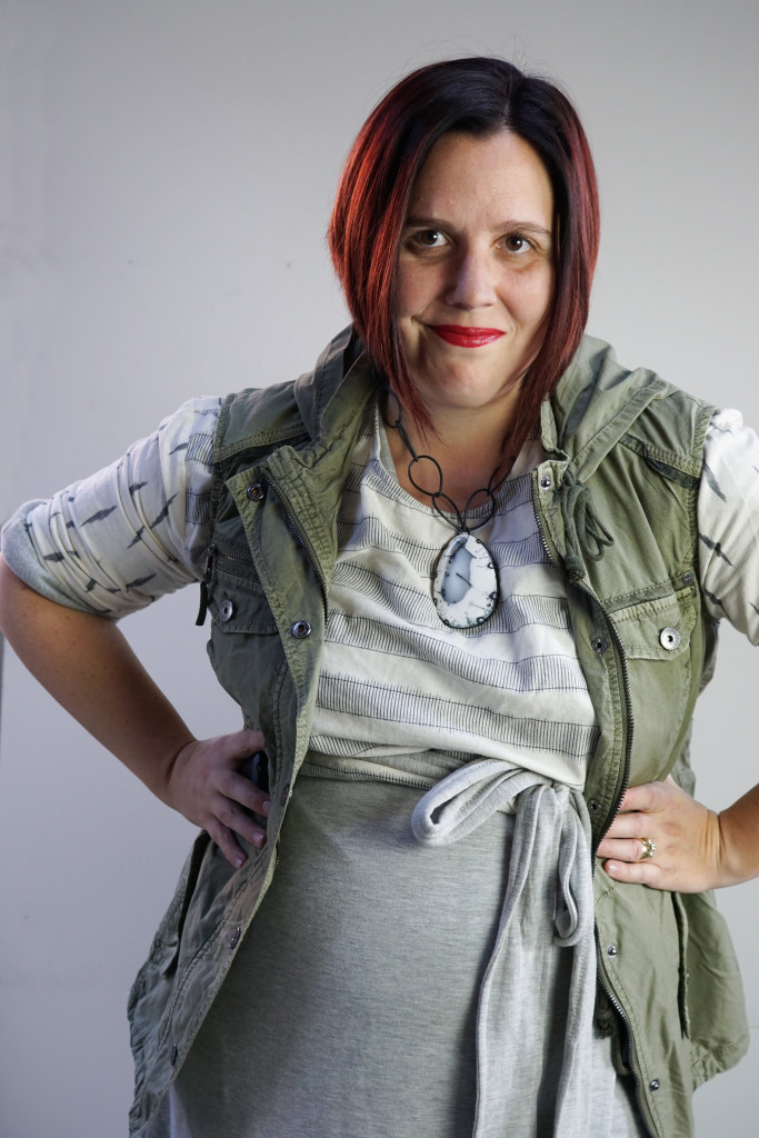 one dress, thirty ways outfit inspiration: grey wrap dress, ikat shirt, military jacket, and chunky amulet necklace 