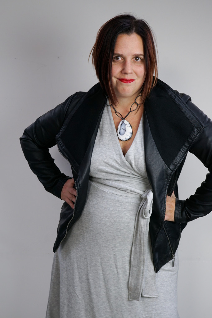 one dress, thirty ways outfit inspiration: grey wrap dress, leather jacket, chunky gemstone statement necklace