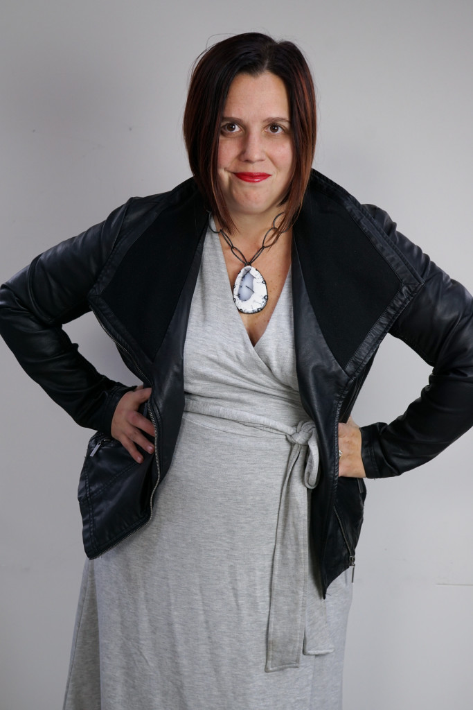 one dress, thirty ways outfit inspiration: grey wrap dress, leather jacket, chunky gemstone statement necklace