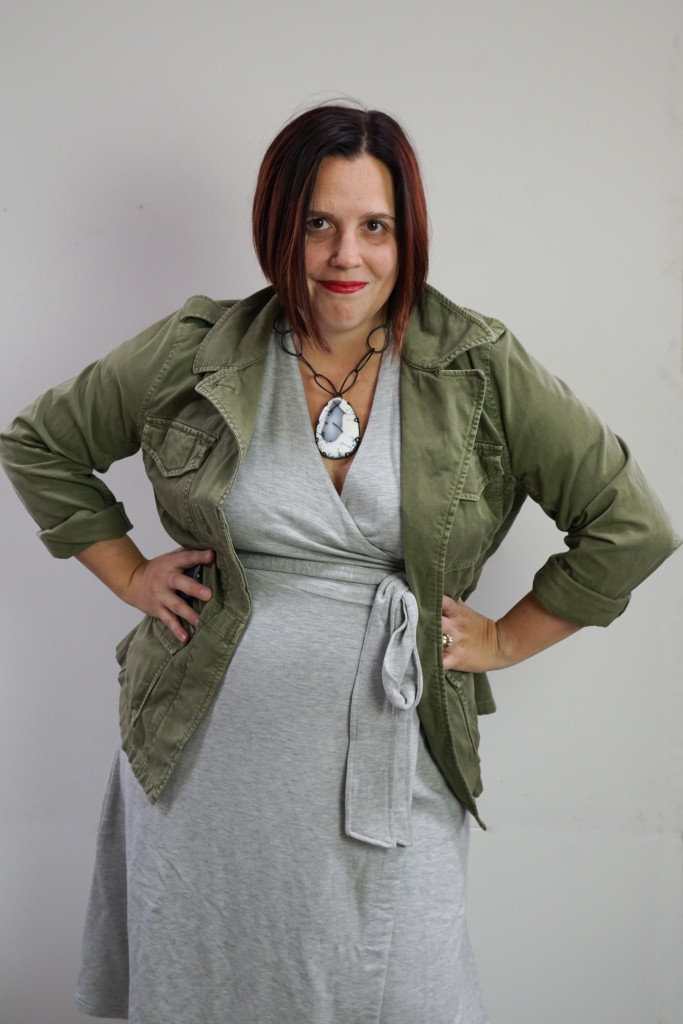 one dress, thirty ways style inspiration: grey wrap dress, military jacket, and chunky gemstone statement necklace