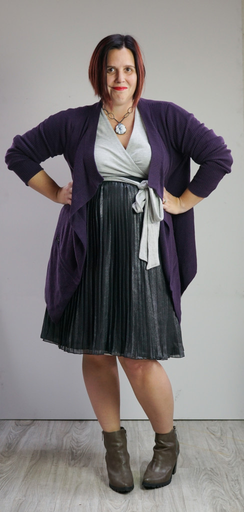 one dress thirty ways creative outfit inspiration: grey wrap dress, black metallic skirt, oversized purple cardigan, and chunky gemstone necklace