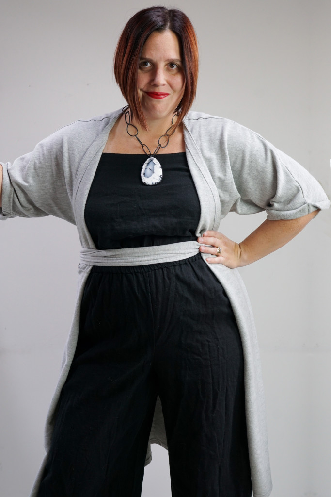 one dress, thirty ways: creative outfit ideas: grey wrap dress over black jumpsuit
