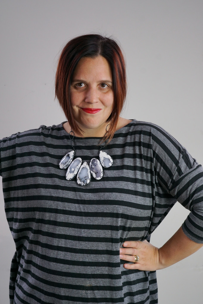 one dress, three necklaces: chunky gemstone necklace with oversized grey and black striped dress