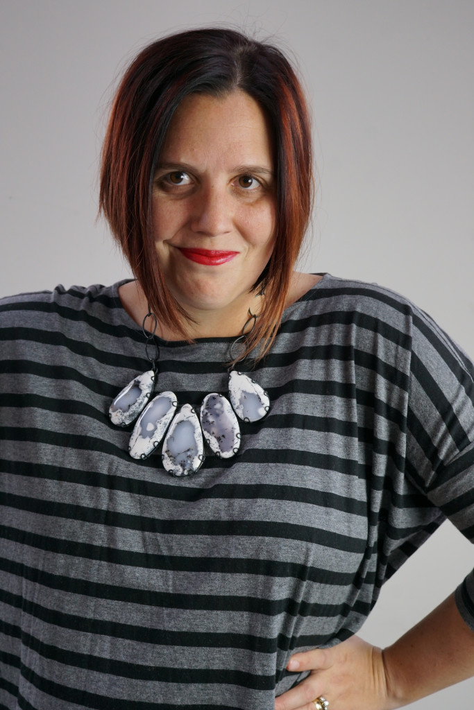 one dress, three necklaces: chunky gemstone necklace with oversized grey and black striped dress