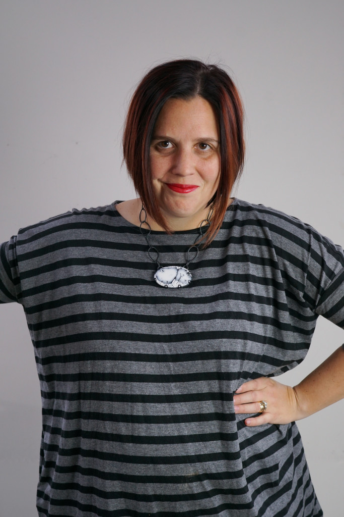 one dress, three necklaces: chunky gemstone necklace with oversized grey and black striped dress