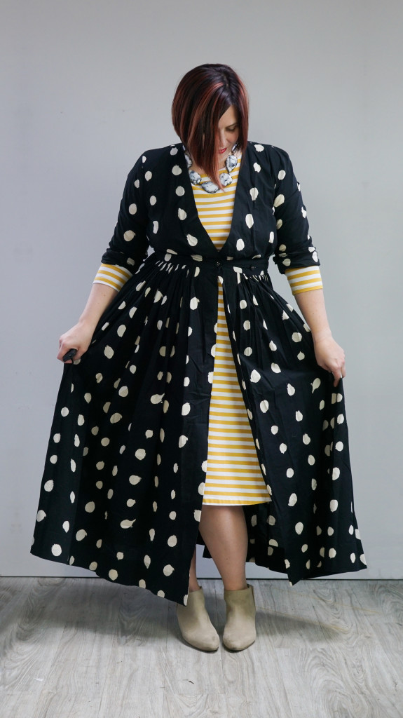 creative outfit inspiration, one dress, thirty ways: black and white maxi shirt dress over yellow striped midi dress with statement necklace