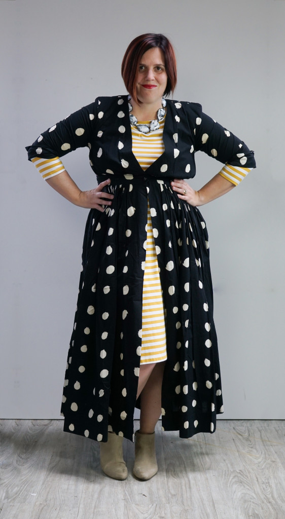 creative outfit inspiration, one dress, thirty ways: black and white maxi shirt dress over yellow striped midi dress with statement necklace