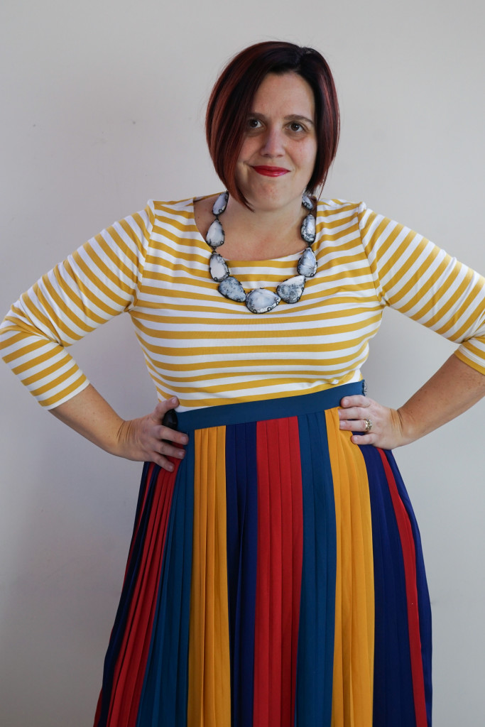 outfit inspiration: one dress, thirty ways: striped midi skirt over striped dress with statement necklace