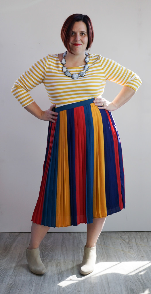 outfit inspiration: one dress, thirty ways: striped midi skirt over striped dress with statement necklace