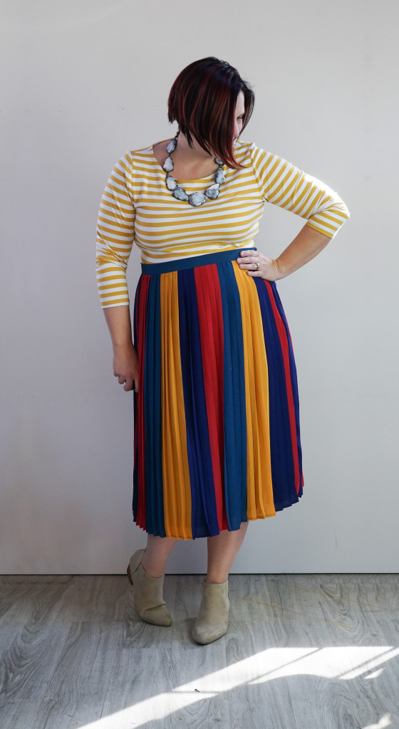 outfit inspiration: one dress, thirty ways: striped midi skirt over striped dress with statement necklace